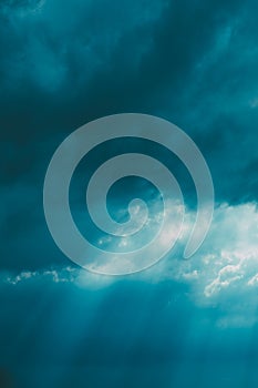 Sunrays Through Blue Rainy Dramatic Sky. Natural Abstract Background