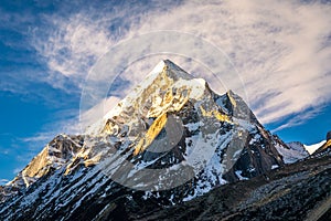 Sunrays falling on peaks of Mount Bhrigupanth