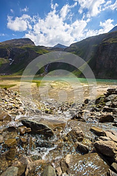 Sunrays on Mountain Lake in High Tauern photo