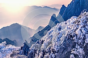 Sunrise above colorful peaks of Huangshan National park.