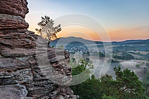 Sunrise above Dahn Rockland seen from Rock Sprinzelfelsen, Dahner Felsenland, Rhineland-Palatinate, Germany