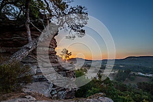 Sunrise above Dahn Rockland seen from Rock Sprinzelfelsen, Dahner Felsenland, Rhineland-Palatinate, Germany