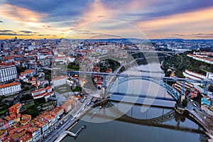 Sunrise aerial of Porto, Portugal, the Douro River, and Dom Luis Bridge