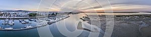 Sunrise aerial seascape view of Olhao Marina, waterfront to Ria Formosa natural park.