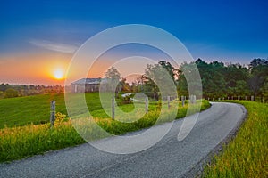 Sunrise Along a Counrty Road with Barn photo