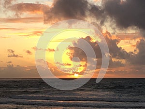 Sunrise in August in Wailua Bay on Kauai Island, Hawaii - Wailua River Entering Pacific Ocean.