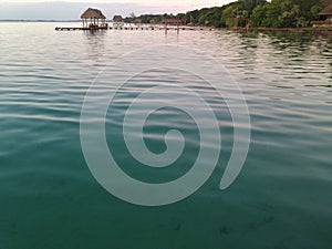 Sunrise in Bacalar, blue and green