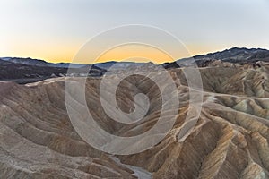 Sunrise on the badlands of Zabriskie Point, Death Valley National Park, California