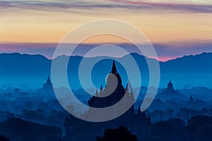 Sunrise in Bagan, view from high point, dominating blue color.