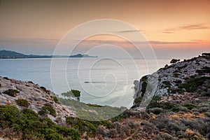 Sunrise at bay near city Kolympia, Rhodes, Greece