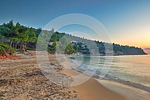 The sunrise at the beach Chrisi Milia of Alonissos, Greece