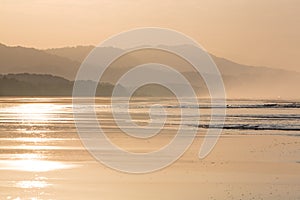 Sunrise on the beach of Matapalo in Costa Rica photo