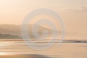 Sunrise on the beach of Matapalo in Costa Rica photo