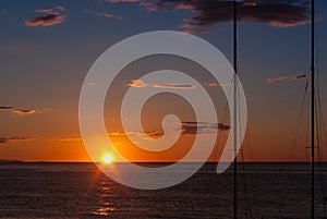 Sunrise on the beach with two catamarans stranded on the shore in Mojacar Almeria