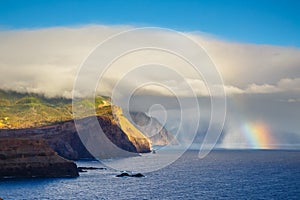 Sunrise and beautiful rainbow over Ponta de Sao Lourenco, Madeira