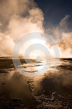 Sunrise behind fumaroles at an altitude of 4300m, in El Tatio Geysers at the Atacama desert in Chile