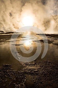 Sunrise behind fumaroles, at an altitude of 4300m over sea level, El Tatio Geysers