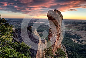 Sunrise behind the Maiden. Boulder, CO