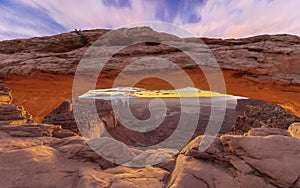 Sunrise behind Mesa Arch in Canyonlands National Park, Utah