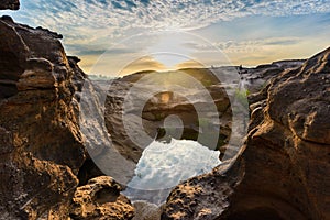 Sunrise behind the rock