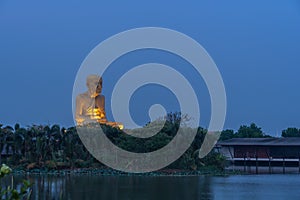 Sunrise at the big Buddhist Monks Luang Phor Tuad Statue