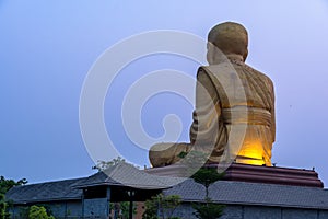 Sunrise at the big Buddhist Monks Luang Phor Tuad Statue