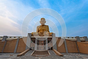 Sunrise at the big Buddhist Monks Luang Phor Tuad Statue