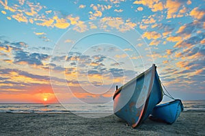 Sunrise at Black Sea over an old fishing boats