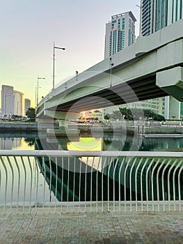 Sunrise and bridge contacting two island