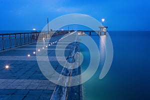 Before sunrise in Burgas bay. Bridge in Burgas, Bulgaria. Long exposure, blue hour. Kay port