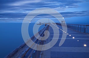 Before sunrise in Burgas bay. Bridge in Burgas, Bulgaria. Long exposure, blue hour. Kay port