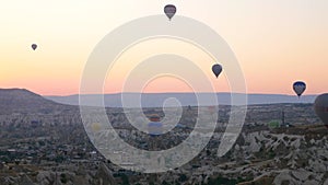 Sunrise in Cappadocia with air balloons. Cappadocia air balloons background.