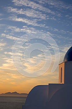 Sunrise at a church near Pori Oia on Greek Island of Santorini Greece