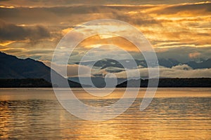 Sunrise with clouds at Naknek Lake in Brooks Falls camp, Alaska