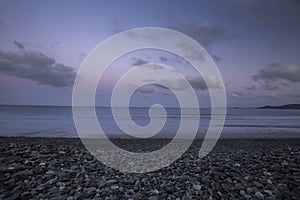 Sunrise Clouds over Pebble Beach in Wales, UK