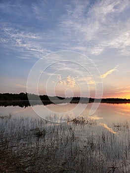 Sunrise cloudscape over Nine Mile Pond in Everglades National Park, Florida.