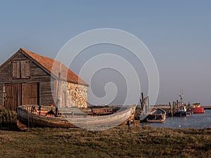 Sunrise on the Coal barn with Boats in Harbour