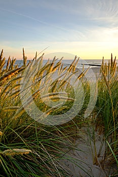 Sunrise on the coast of the Baltic Sea, Kolobrzeg, Poland.