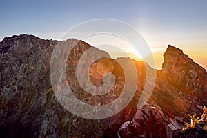 Sunrise on the crater rim of Bali`s Mount Agung volcano before eruption