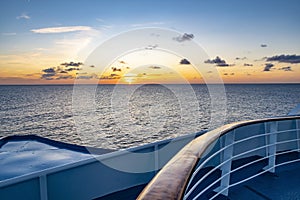 Sunrise at the cruise ship with view to horizon