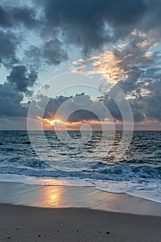 Sunrise and dramatic sky, Pentewan Sands, Cornwall