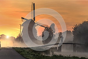 Sunrise on the Dutch windmill