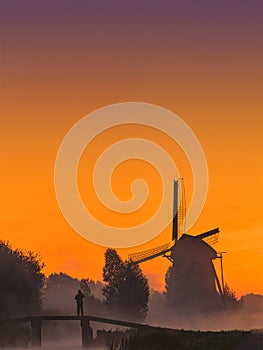 Sunrise on the Dutch windmill with space for text