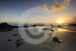 Sunrise on the east coast, Northland, New Zealand photo