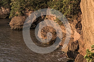 Sunrise famous Hopewell Rocks geologigal formations at low tide biggest tidal wave Fundy Bay New Brunswick Canada