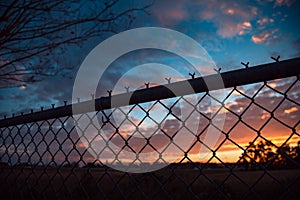 Sunrise and fence