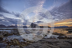 Sunrise by the fjord in Flakstad island, lofoten archipelago