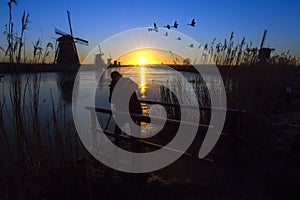 Sunrise on the frozen windmills alignment