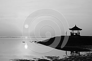 Sunrise at the gazebo Bali, Indonesia in black and white photo.