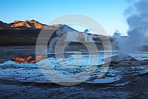 Sunrise on geyser field El Tatio, Chile photo